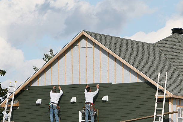 Professional Emergency Siding Repair technician working in Hines, IL